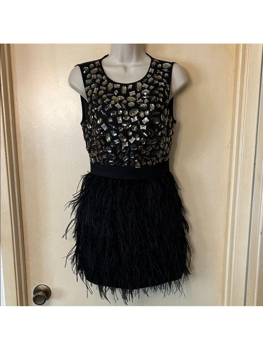 bebe Black Dress with Gold Rhinestones and Feather Skirt size 0